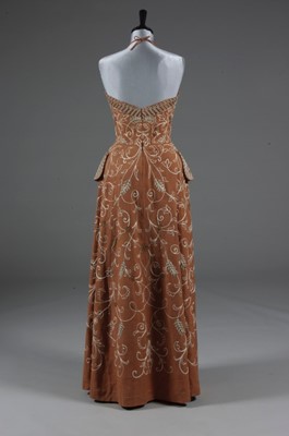Lot 126 - A Bruyre couture embroidered linen ensemble,...