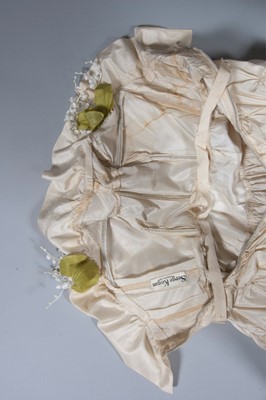 Lot 123 - A Serge Kogan couture ivory taffeta...