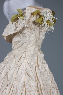 Lot 123 - A Serge Kogan couture ivory taffeta...