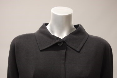Lot 125 - A Balenciaga couture black jersey coat, 1957,...