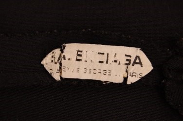Lot 125 - A Balenciaga couture black jersey coat, 1957,...