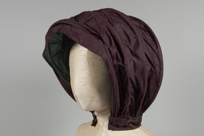 Lot 32 - A purple silk caleche bonnet, late 18th...