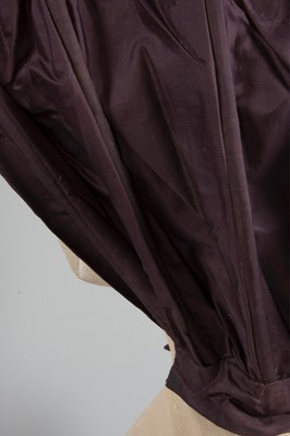 Lot 32 - A purple silk caleche bonnet, late 18th...