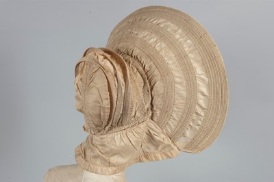 Lot 32 - A purple silk caleche bonnet, late 18th...