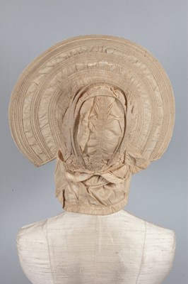 Lot 32 - A purple silk caleche bonnet, late 18th...