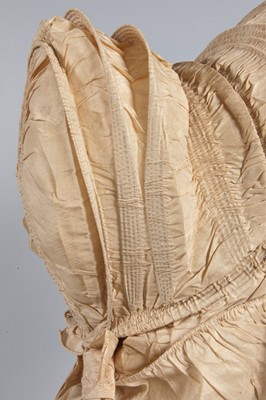 Lot 32 - A purple silk caleche bonnet, late 18th...