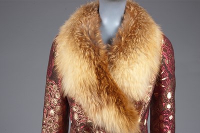 Lot 151 - A Christian Dior couture evening coat, late...