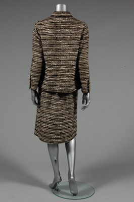 Lot 171 - A Chanel couture suit, 1960s, labelled and...