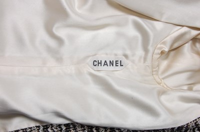 Lot 171 - A Chanel couture suit, 1960s, labelled and...