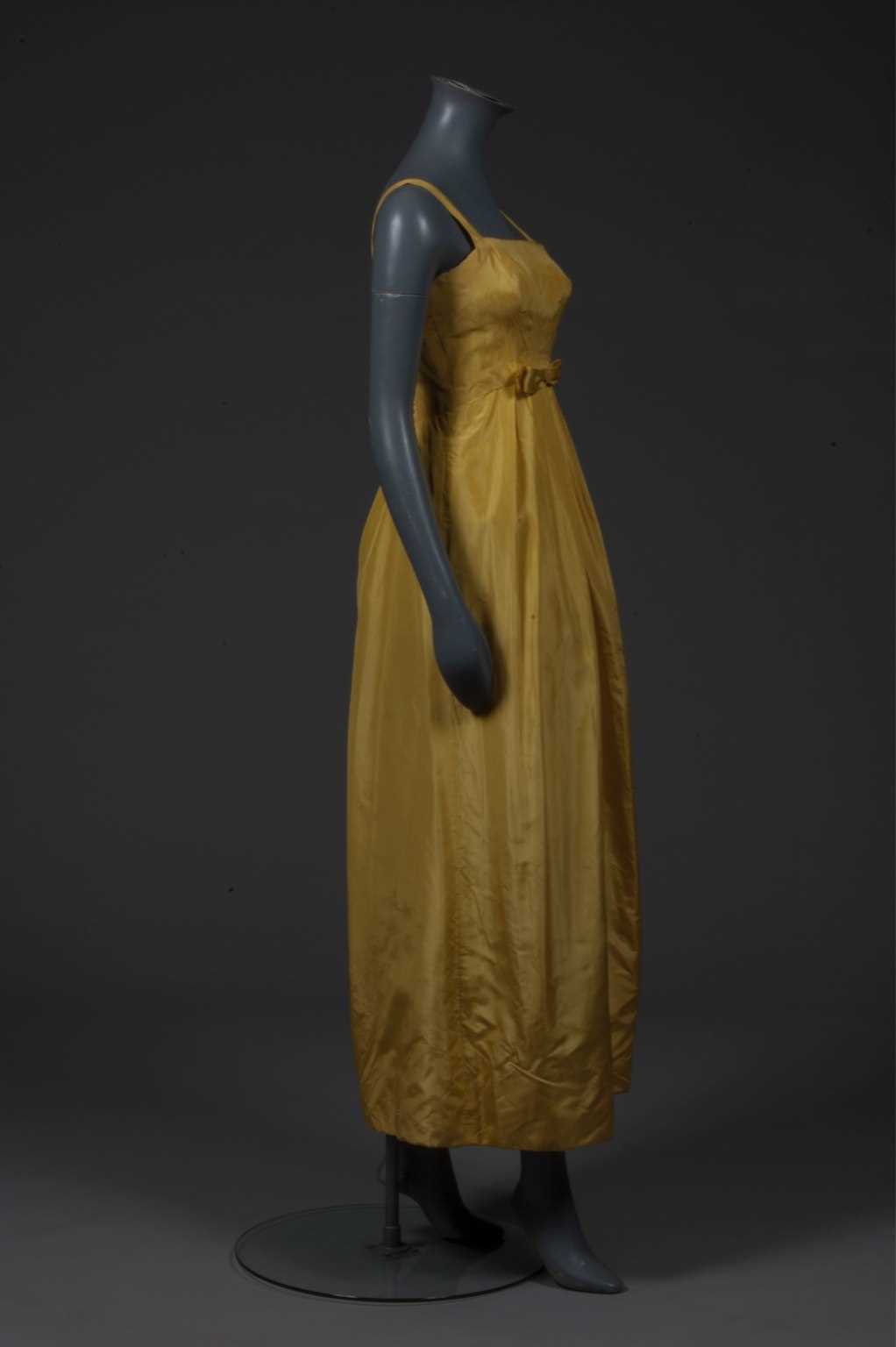 Lot 150 - A Givenchy haute couture brilliant yellow silk...