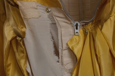 Lot 150 - A Givenchy haute couture brilliant yellow silk...