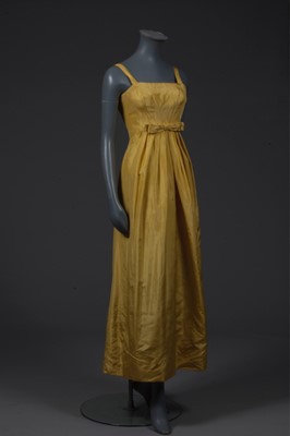 Lot 150 - A Givenchy haute couture brilliant yellow silk...