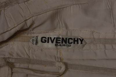 Lot 150 - A Givenchy haute couture brilliant yellow silk...