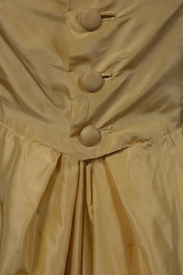 Lot 150 - A Givenchy haute couture brilliant yellow silk...