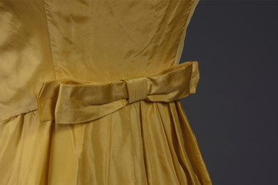 Lot 150 - A Givenchy haute couture brilliant yellow silk...