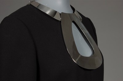 Lot 190 - A Pierre Cardin black wool evening gown with...