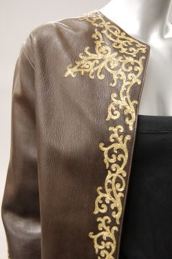 Lot 217 - A Nina Ricci embroidered brown leather evening...