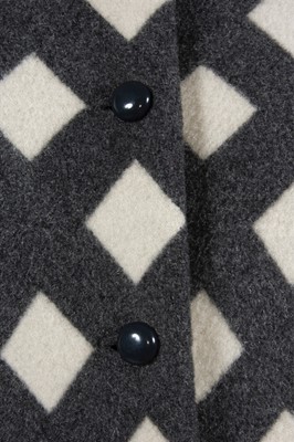 Lot 212 - A Pauline Trigre woven window-pane cape, 1974,...