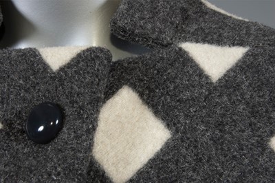 Lot 212 - A Pauline Trigre woven window-pane cape, 1974,...
