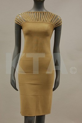 Lot 112 - An Herve Leger beige elastane dress, probably...