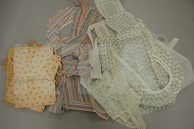Lot 15 - 1930s maid uniform accessories, in brightly...