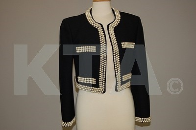 Lot 19 - A Moschino Chanel-style jacket, 1990s,...