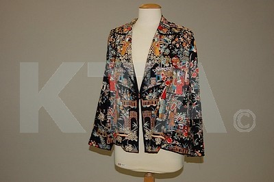 Lot 21 - A group of late 1920s-early 1930s clothing,...
