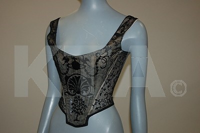 Lot 24 - Three Vivienne Westwood corset-bodices, 1990s,...