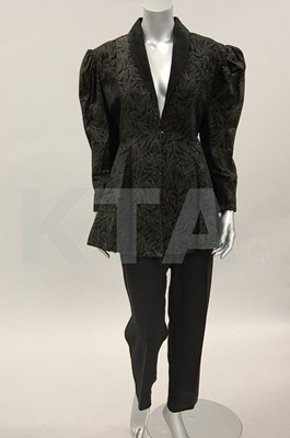 Lot 53 - Six red and black 70s ensembles, comprising:...