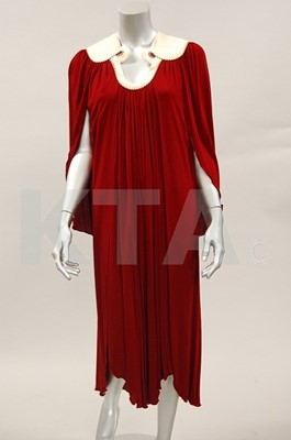 Lot 69 - An unusual Ossie Clark wine jersey dress,...