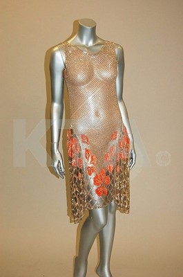 Lot 5 - A beaded pink tulle flapper dress, late 1920s,...