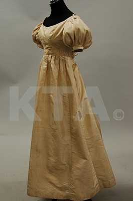 Lot 92 - An oyster taffeta gown, mid 1820s, together...