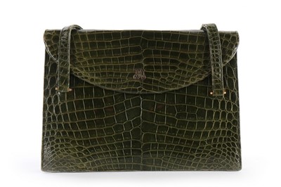Lot 2 - A Christian Dior green crocodile handbag,...
