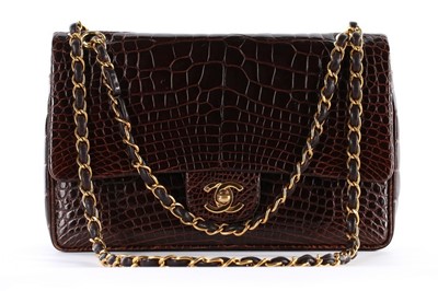Lot 8 - A Chanel brown polished alligator double-flap...