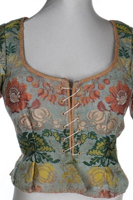 Lot 21 - A woman's brocaded silk bodice, probably...
