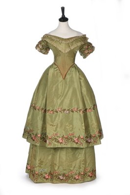 Lot 33 - A brocaded green silk taffeta ball gown, mid...
