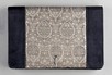 Lot 6 - A Cartier brocaded silk and navy suede evening...