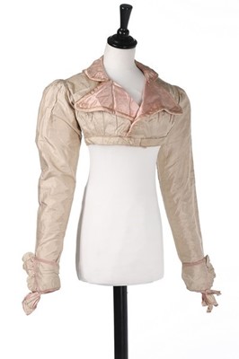 Lot 29 - A rare beige and pink silk spencer, 1810-20,...