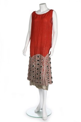 Lot 56 - A rare Alfred Lenief couture orange lamé crpe...