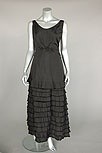 Lot 115 - A black taffeta evening gown, possibly Worth,...
