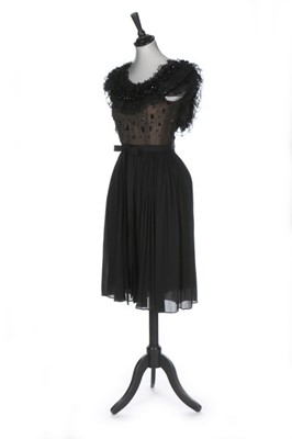 Lot 87 - A Pierre Balmain couture black chiffon...