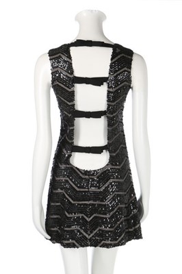 Lot 106 - An André Courrèges sequined organza mini dress,...