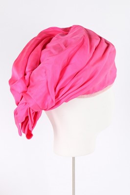 Lot 141 - Three Balenciaga silk turban-style hats, circa...