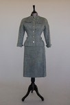 Lot 139 - A Pierre Balmain grey tweed suit, circa 1950,...