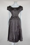 Lot 118 - A Christian Dior New York black satin cocktail...
