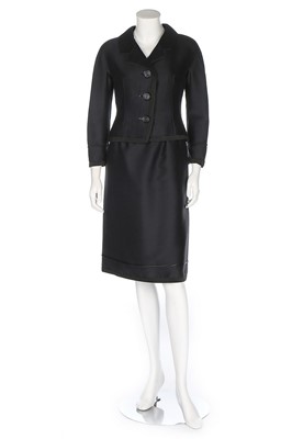 Lot 21 - A Christian Dior New York black silk-wool suit,...