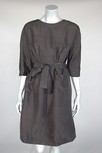 Lot 132 - A Balenciaga couture black slubbed silk dinner...