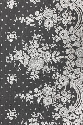 Lot 431 - A Brussels needlepoint lace flounce, 1860s,...
