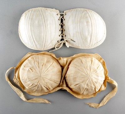 Lot 57 - A rare pair of grapefruit shaped bust...
