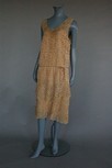 Lot 95 - A couture beige lace cocktail dress,...